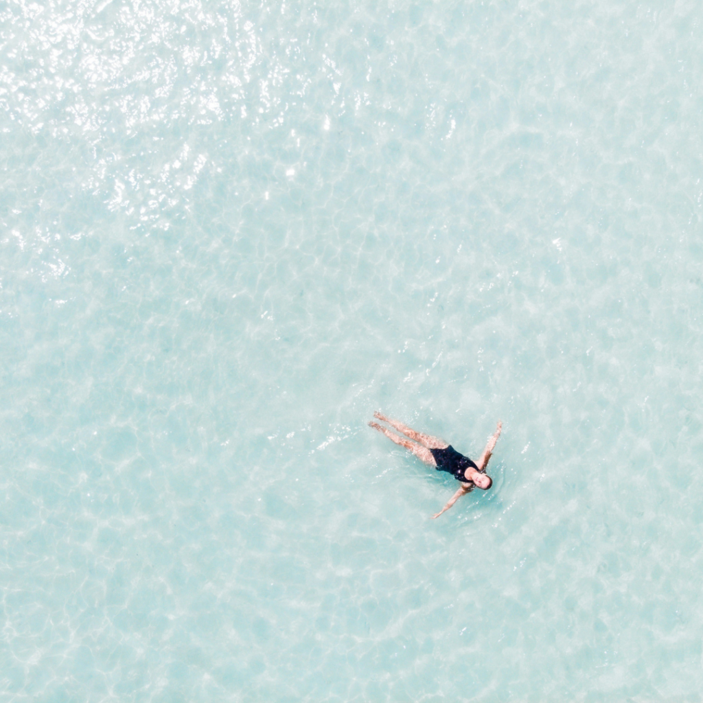 Woman in a serene and pure lake.