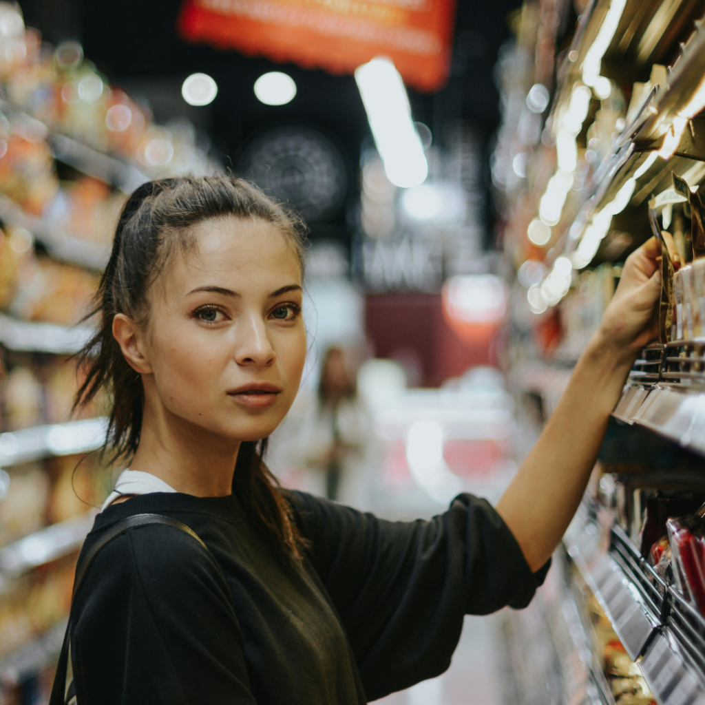 Woman buying groceries.
