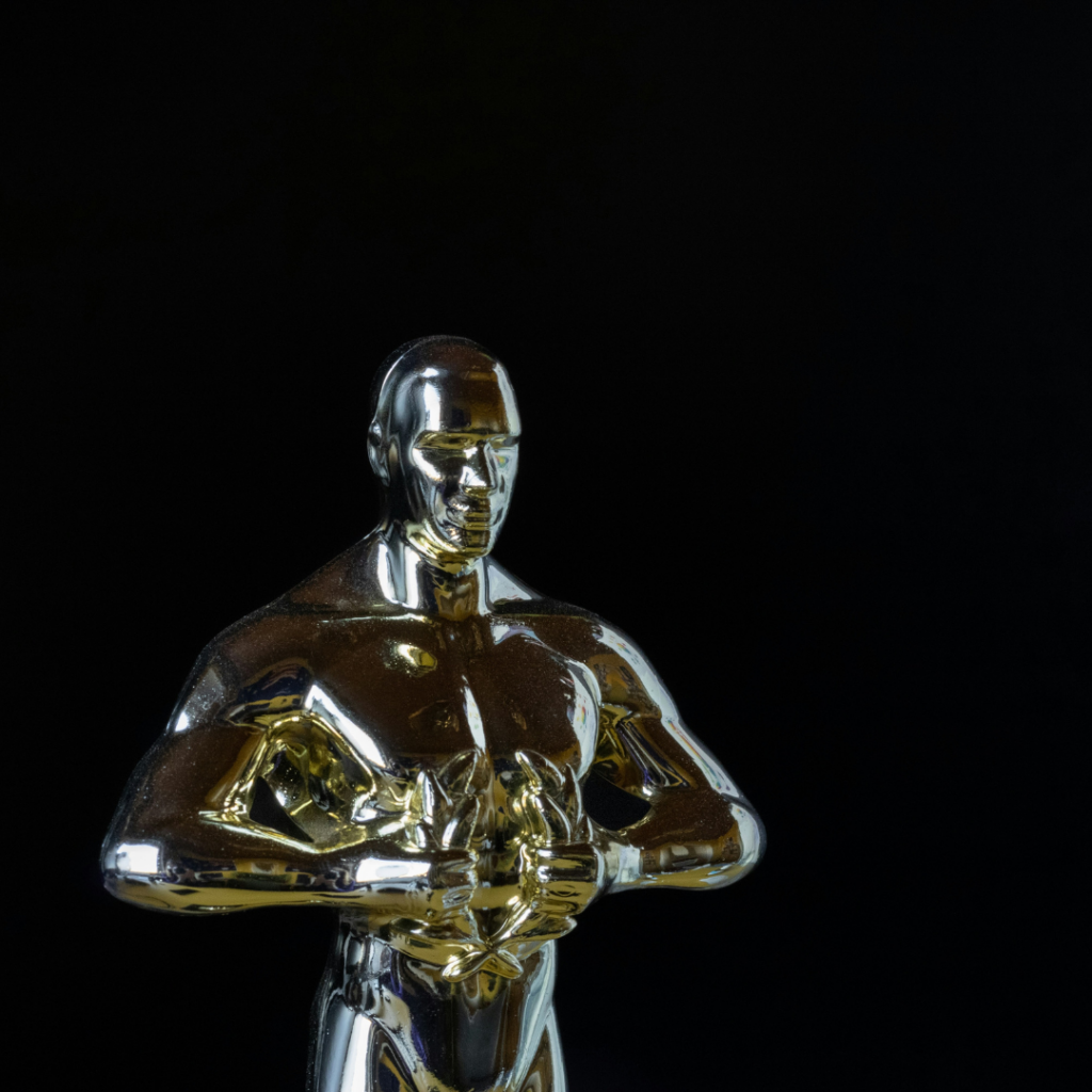 The top of an acadamy award with a black background.