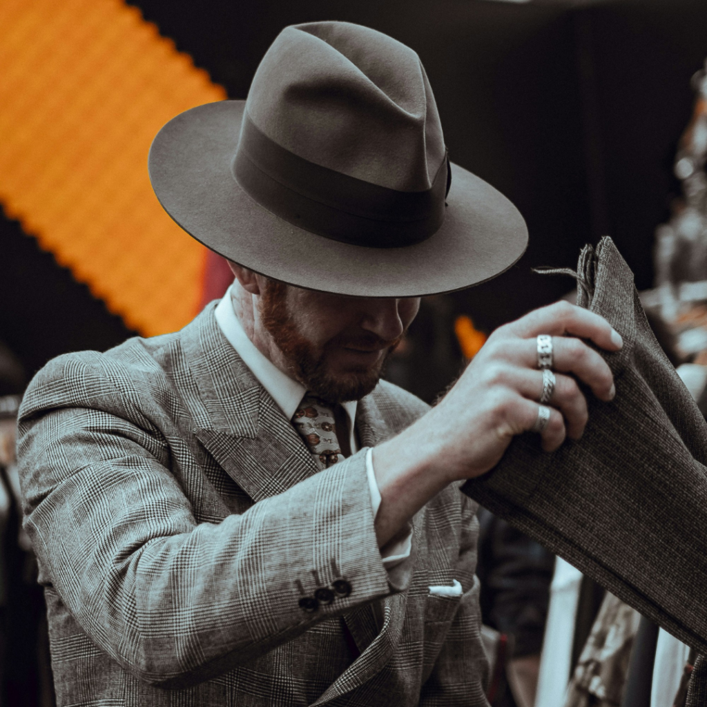 A man shopping for a new suit. Does he really need this? Is it minimalistic?