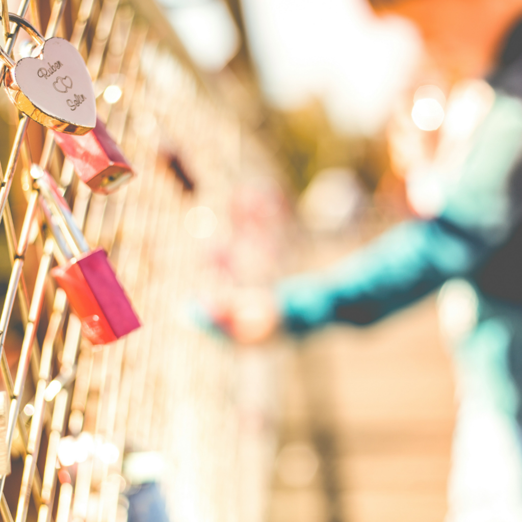 Locks on a fence as a sign of attachments.