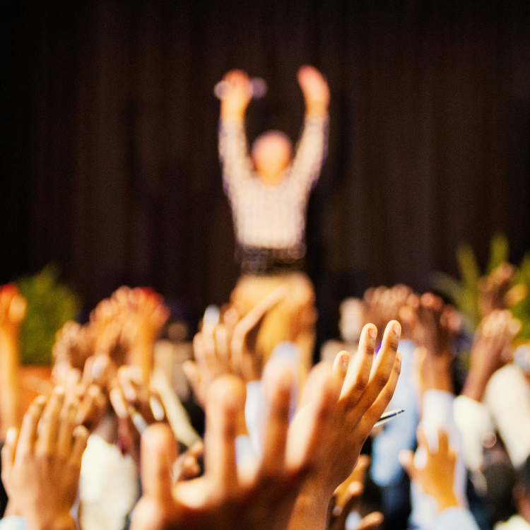A group of people at a motivational speech