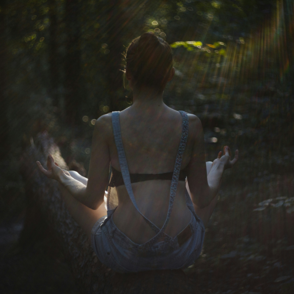 Woman meditating in nature