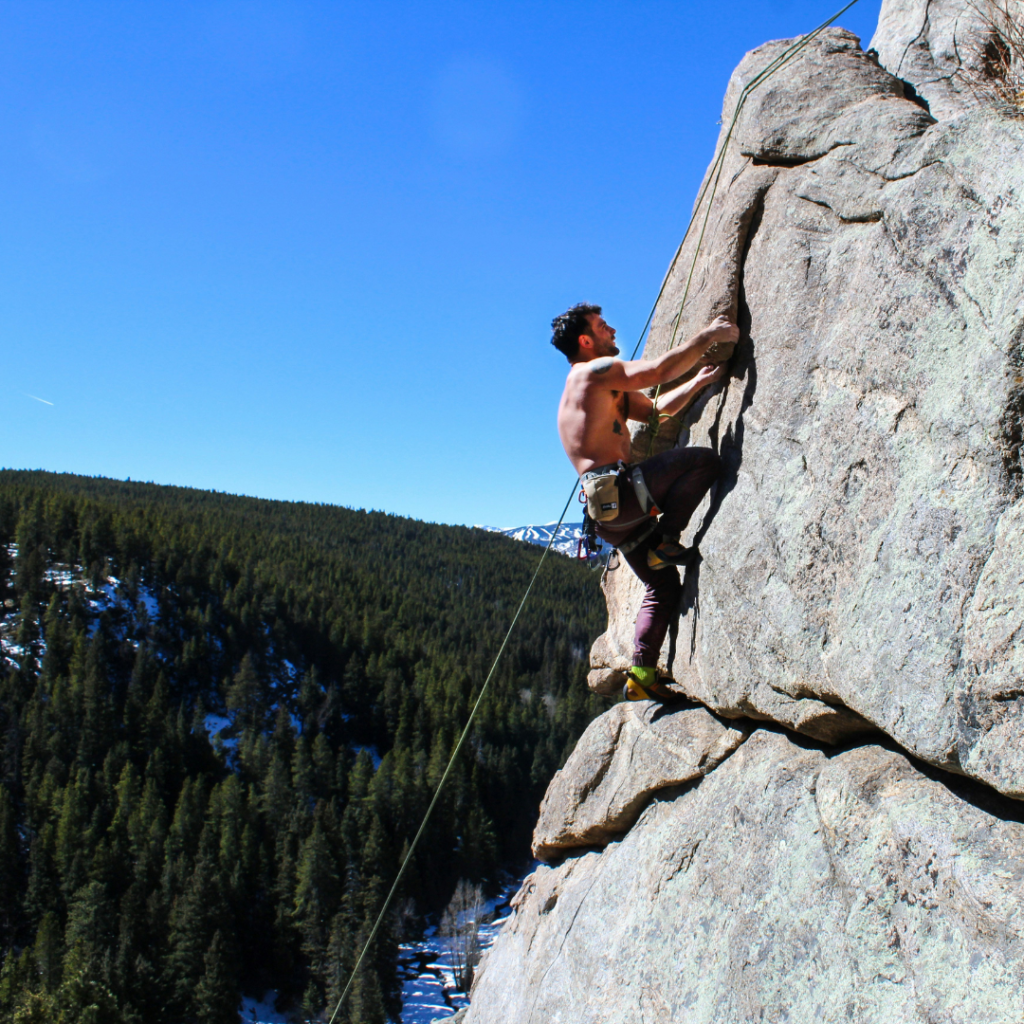Climber facing his obstacle.
