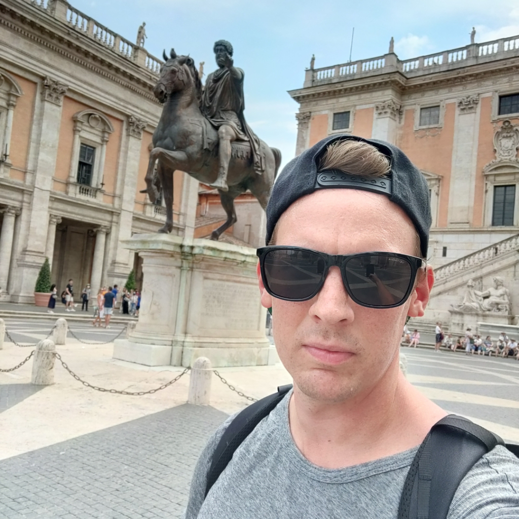 Alex Nielsen in front of the statue of Marcus Aurelius in Rome.