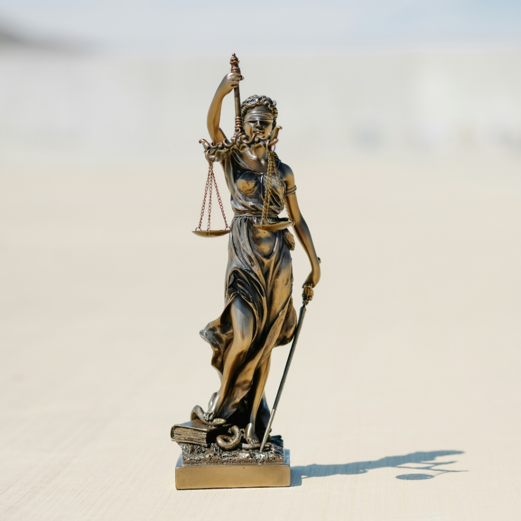 Lady Justice hold up the scale