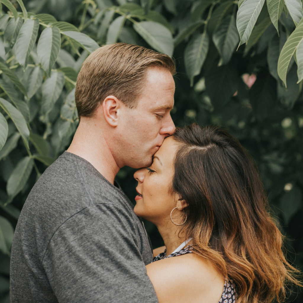 A couple in an embrace of acceptance