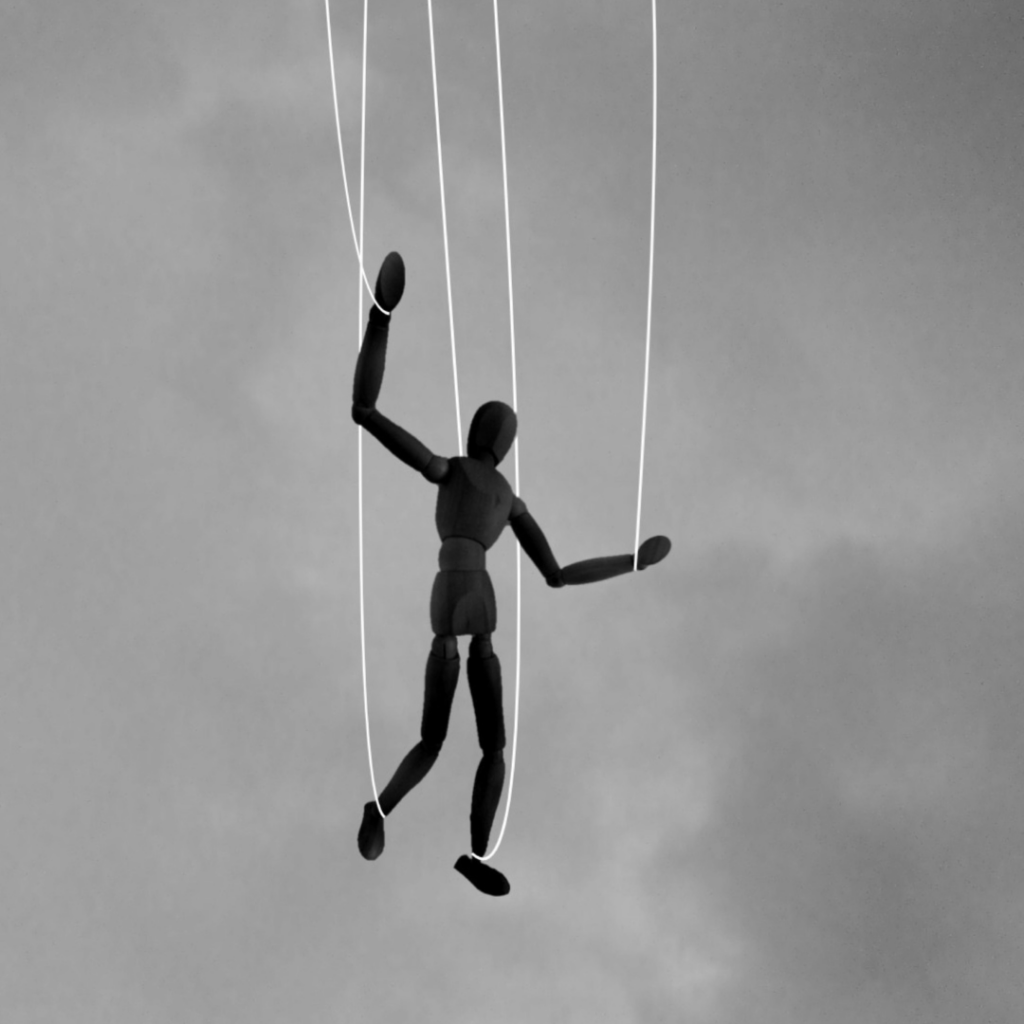 Puppet on strings being controled
